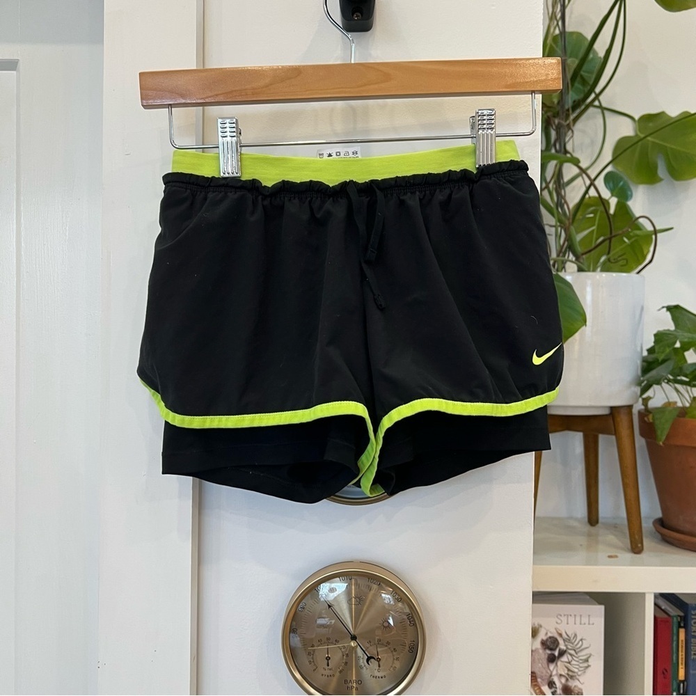 Nike dri fit black and neon green lined running shorts